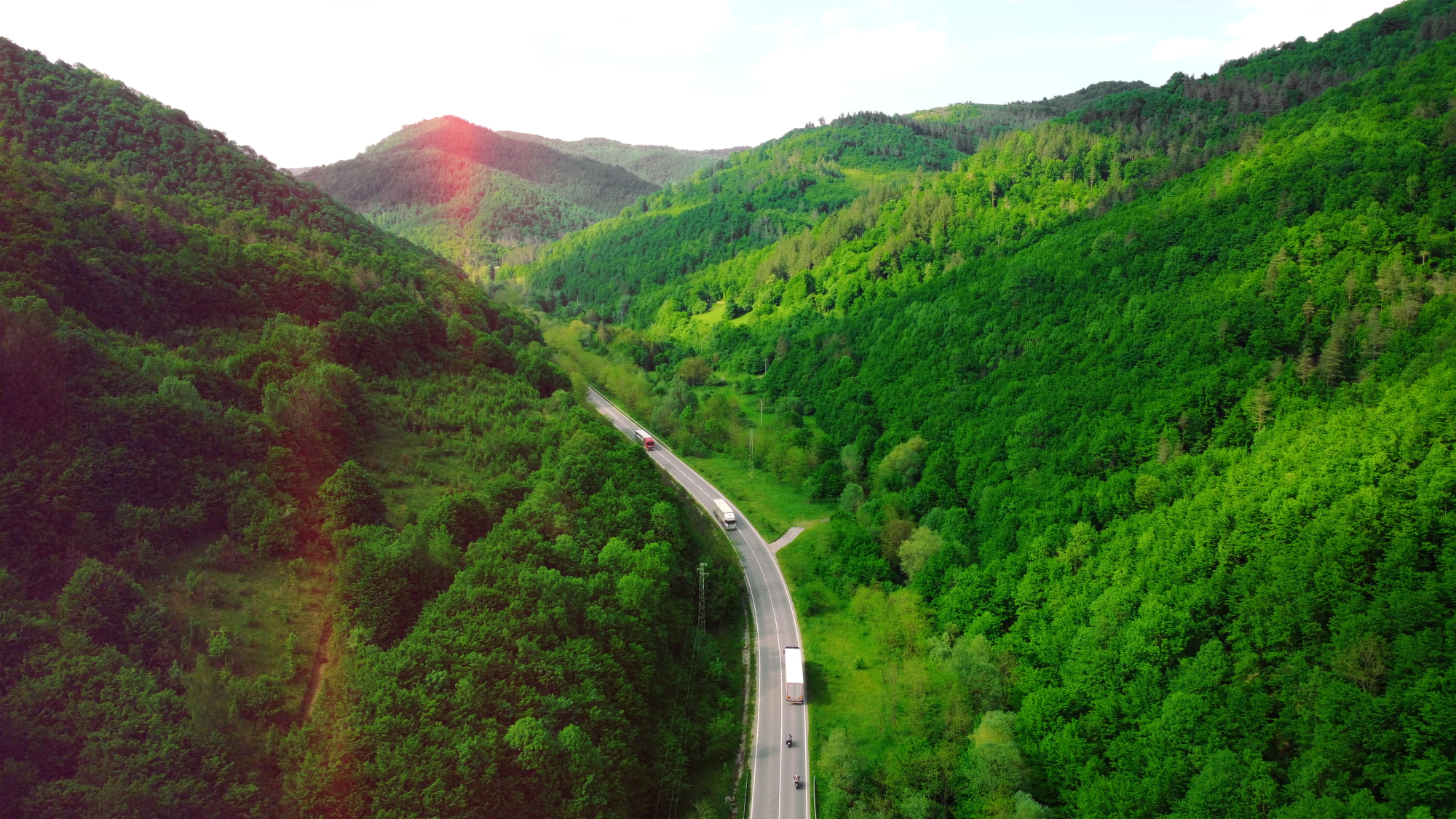 Aerial view of van fleet route through sustainable forest landscape