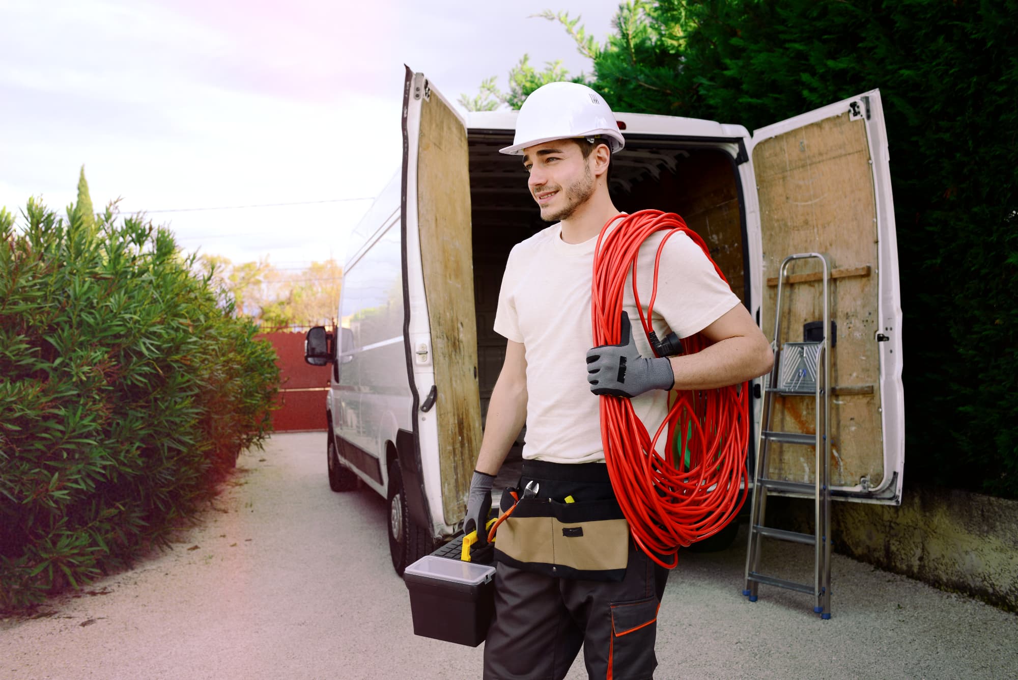 Service technicians with tracked service van using the best van tracker UK facilities management teams recommend